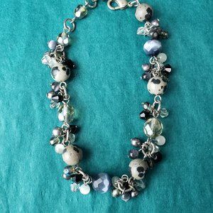 2/15$ Dalmatian jasper and blue cat eye bracelet